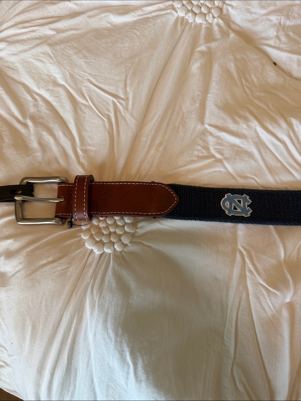 Peter Millar Navy stitched NC logo for UNC Belt with Brown Leather Accents.